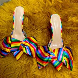 Like New ICONIC oversized bow striped mules